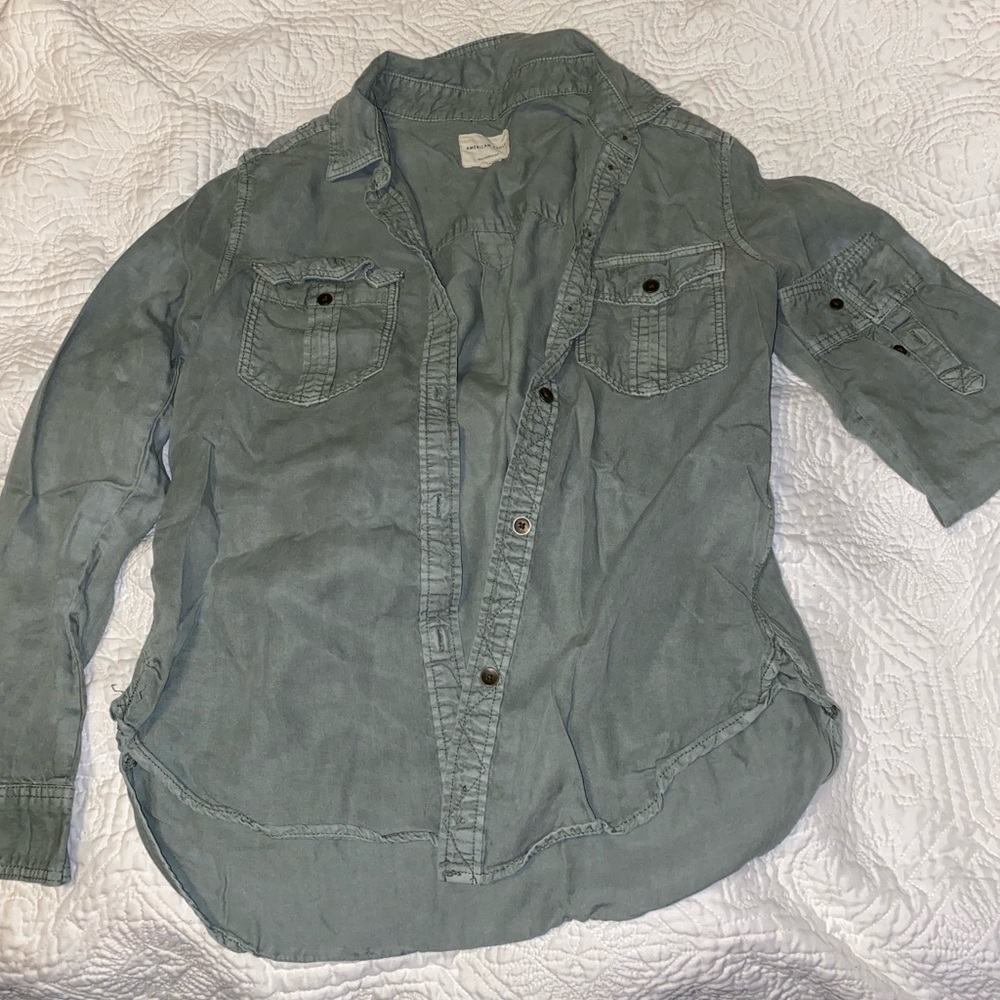 Army green button up shirt I wear it over a shirt like a cardigan.